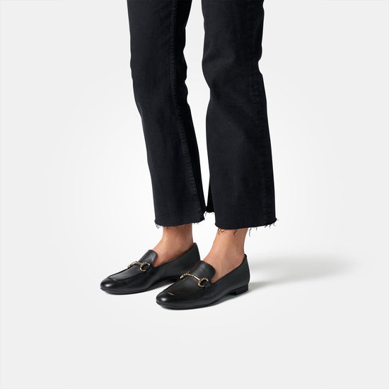 Women with black jeans wearing the Paul Green Daphne pin black leather view 5